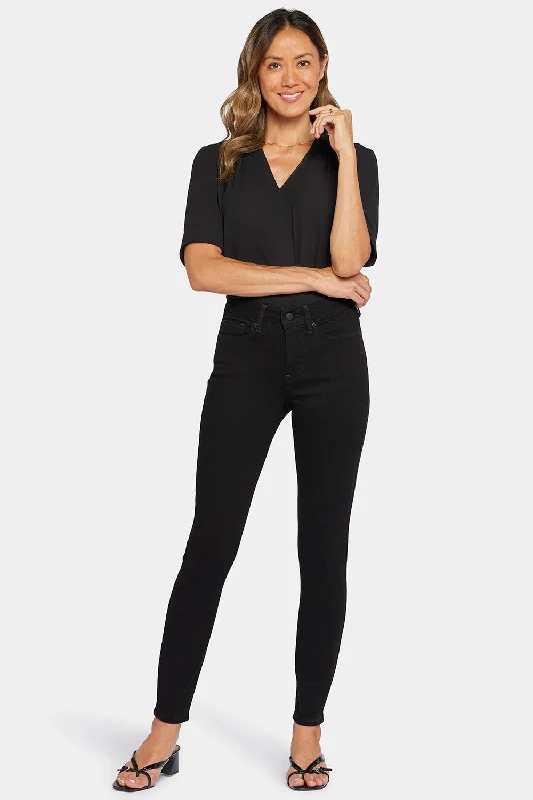 Jeans with reinforced stitching at the stress pointsAmi Skinny Jeans In Tall - Black