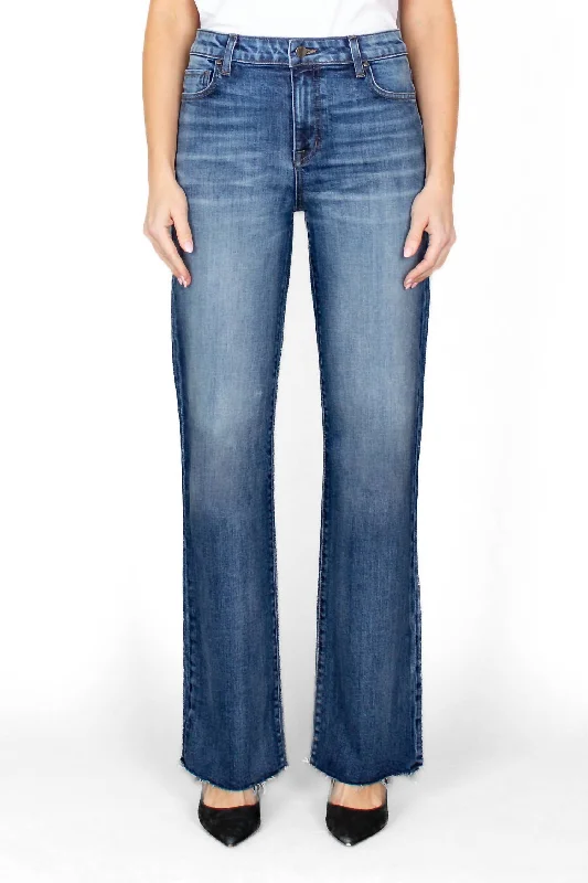 Jeans with a dark wash and subtle fading for a classic and timeless lookKatie Jean In Calypso