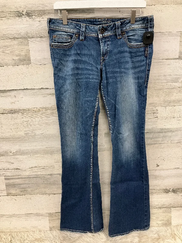 Jeans with a distressed and repaired look for character and charmJeans Flared By Silver In Blue Denim, Size: 10