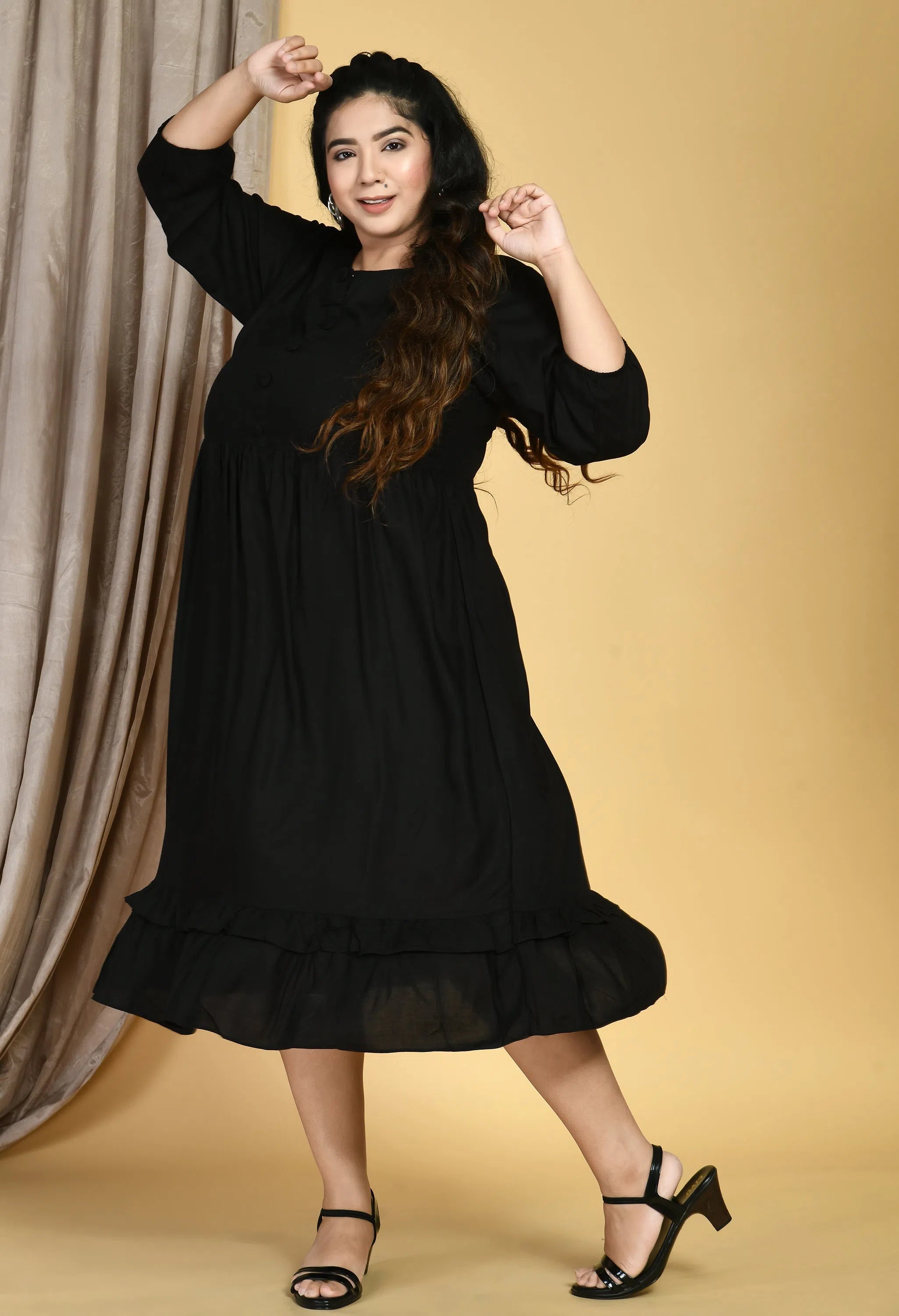 Statement dresses for making a fashion statementPlus Size Black Midi Dress