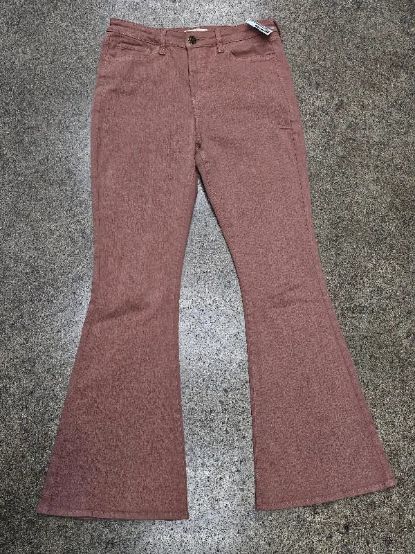 Skinny jeans with rips and tears for an edgy lookJeans Flared By So In Brown, Size:8