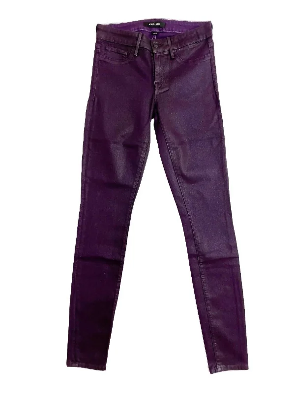 Jeans with a faux leather patch at the back pocketWomen's Mid Rise Slim Coated Skinny Jeans In Purple